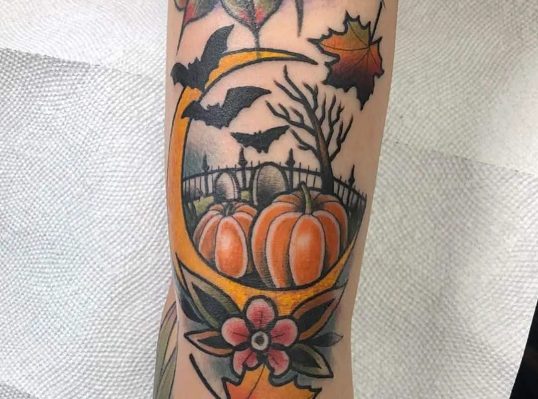 Moon with pumpkin patch and graves tattoo