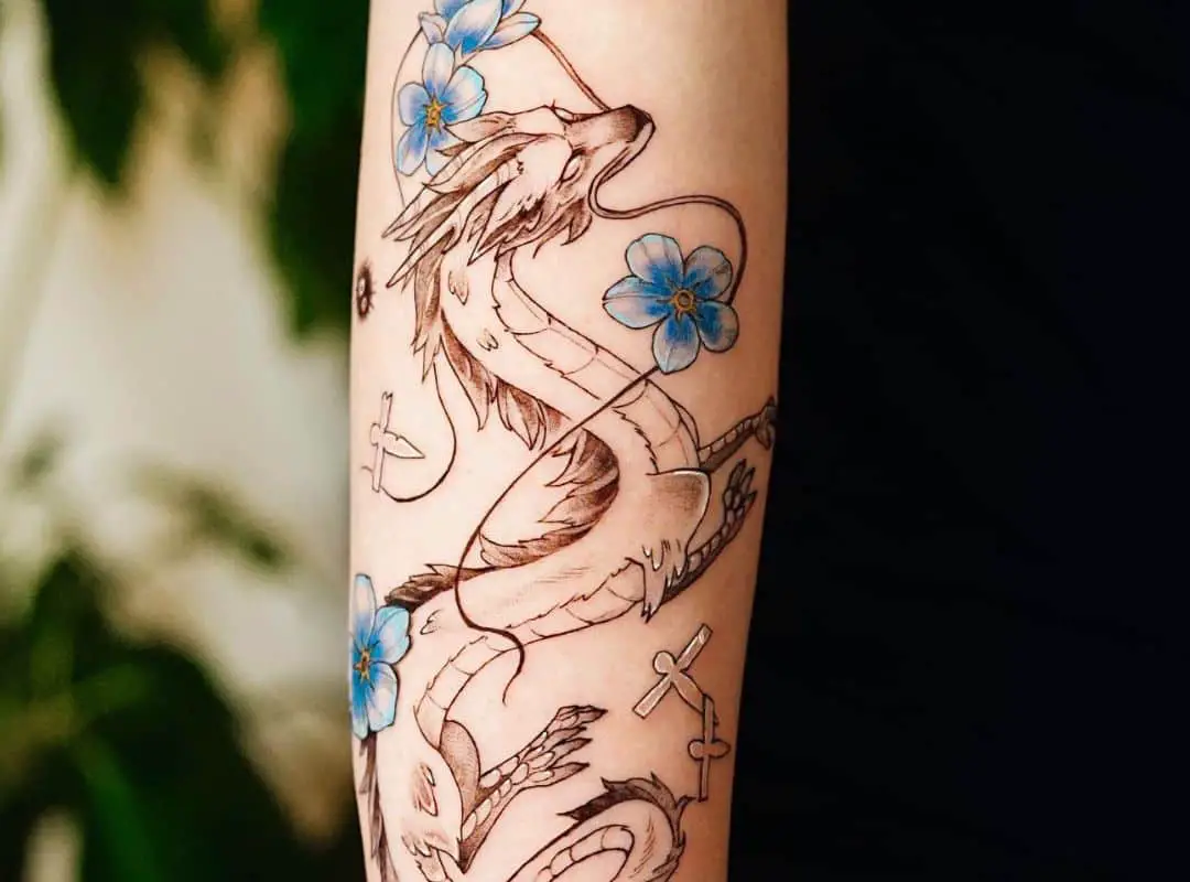 Haku with blue flowers tattoo