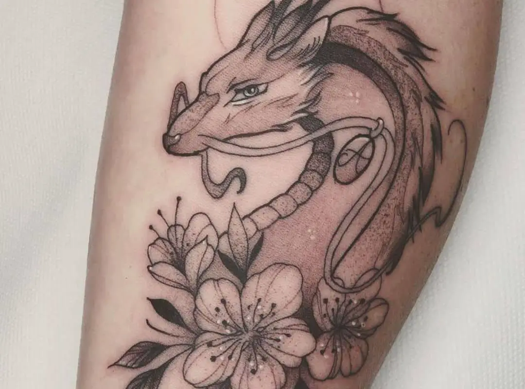 Haku with flowers on the bottom tattoo