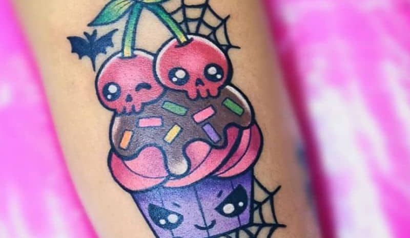 Cupcake and cherries with eyes tattoo