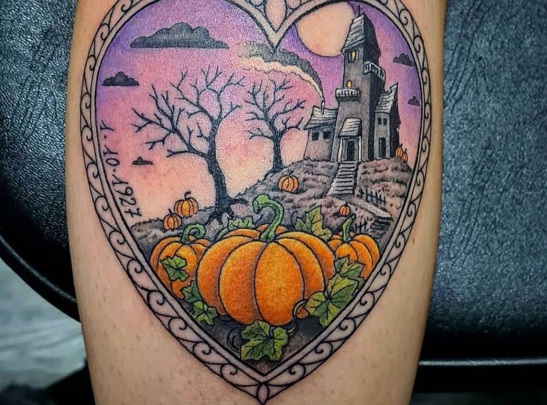 Heart with scary castle and pumkin patch tattoo