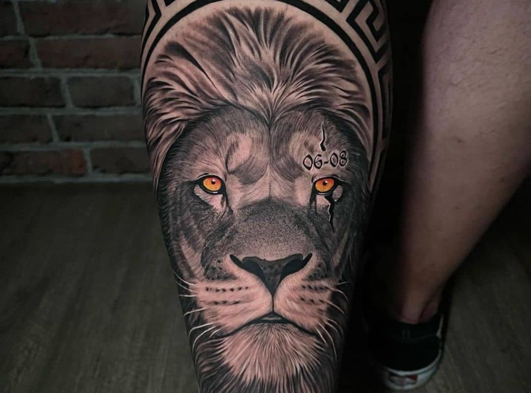 Lion with ornament tattoo