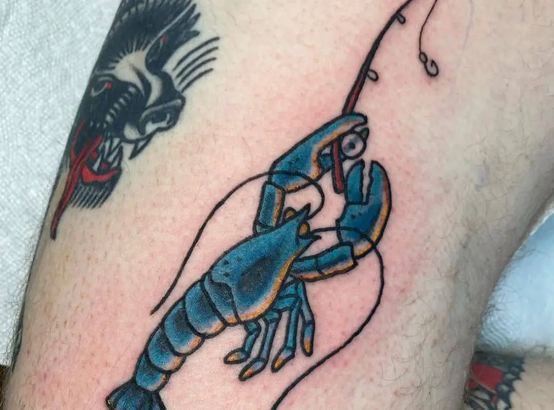 Lobster with a fishing rod tattoo