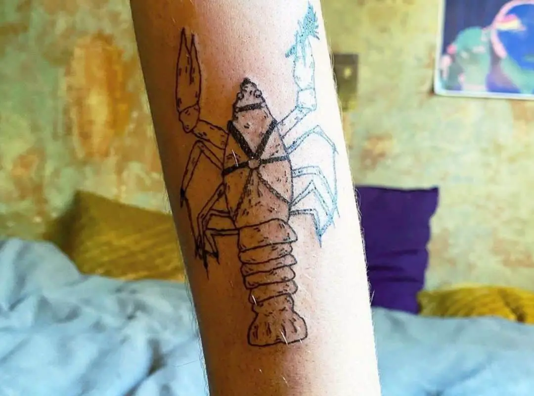 BDSM lobster hand tattoo