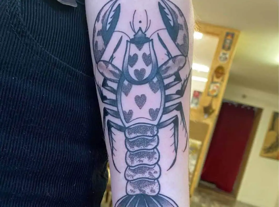 Lobster with hearts on the shell tattoo