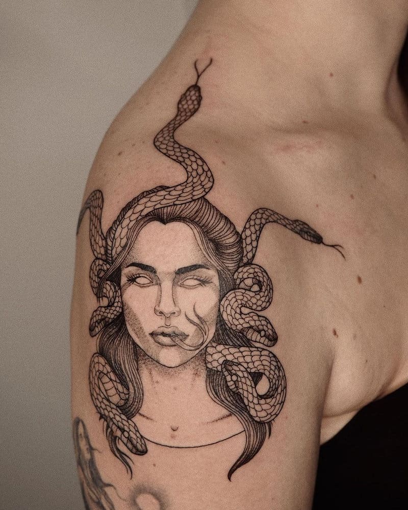 Medusa Gargona tattoo with a snake tongue