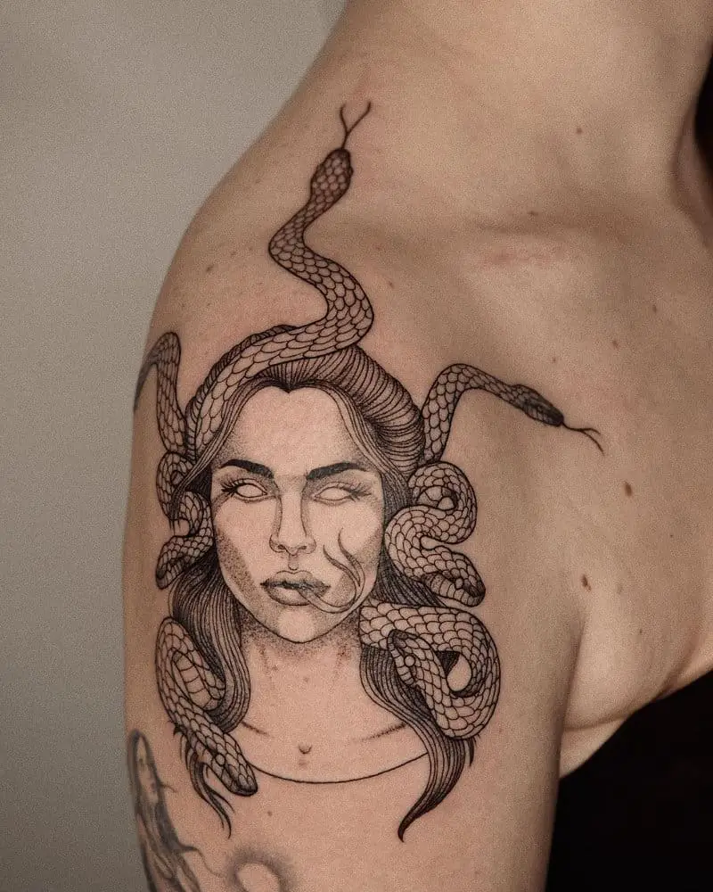 Medusa Gargona tattoo with a snake tongue