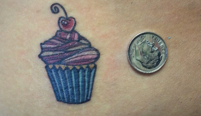 Mini cupcake with berry tattoo