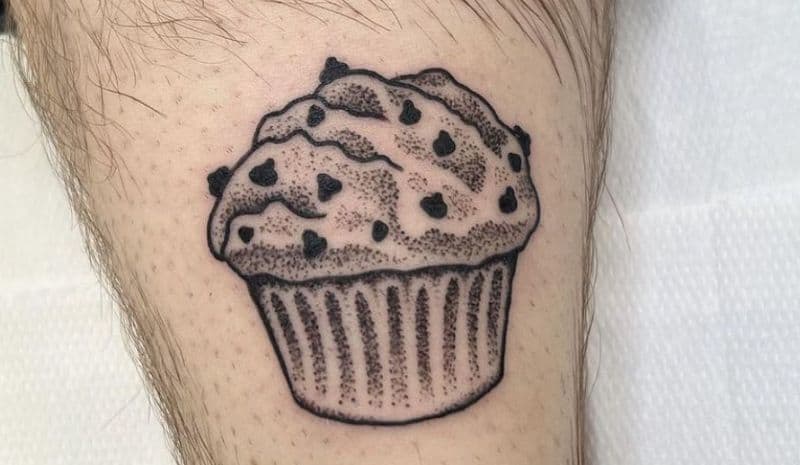 Outline muffin with sprinkles tattoo