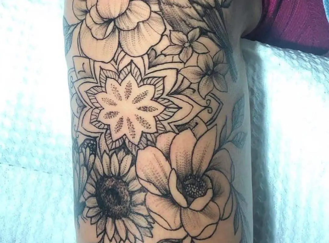 Outline floral design tattoo