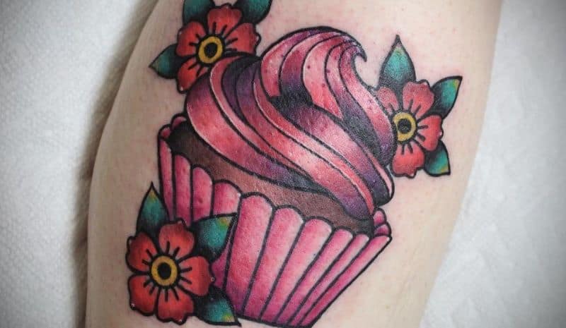 Pink cupcake with flowers tattoo