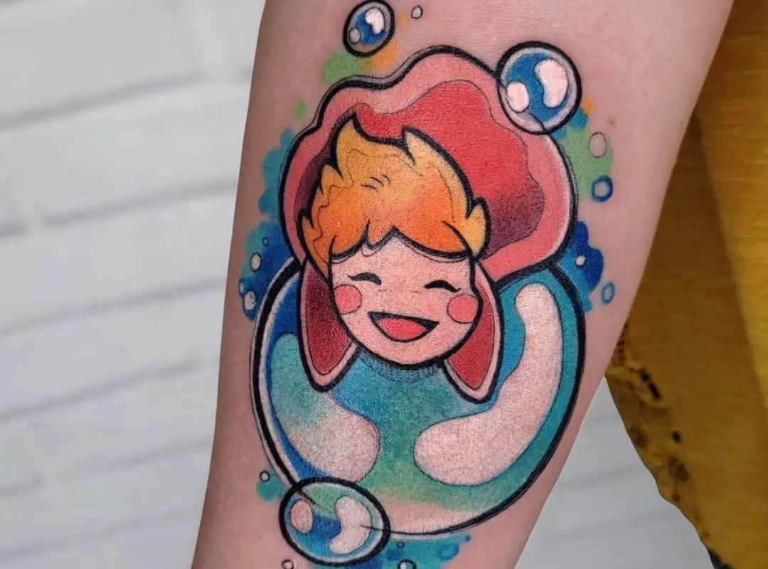 Ponyo laying on the bubble tattoo