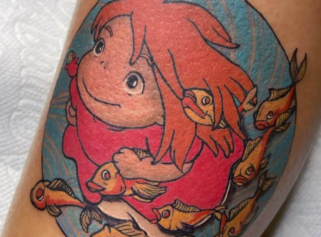 Ponyo and fish in blue circle tattoo