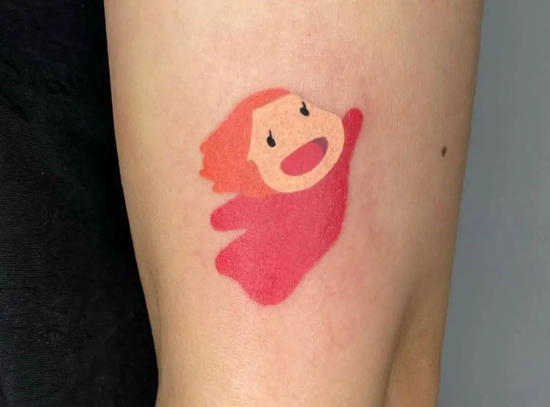 Minimalist Ponyo tattoo near the elbow