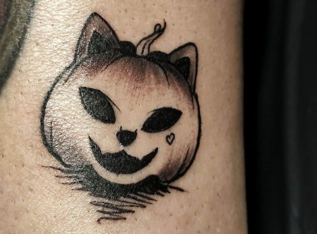Pumkin in a form of cat tattoo