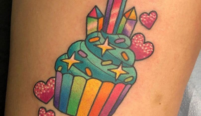 Rainbow cupcake with crystals and hearts tattoo