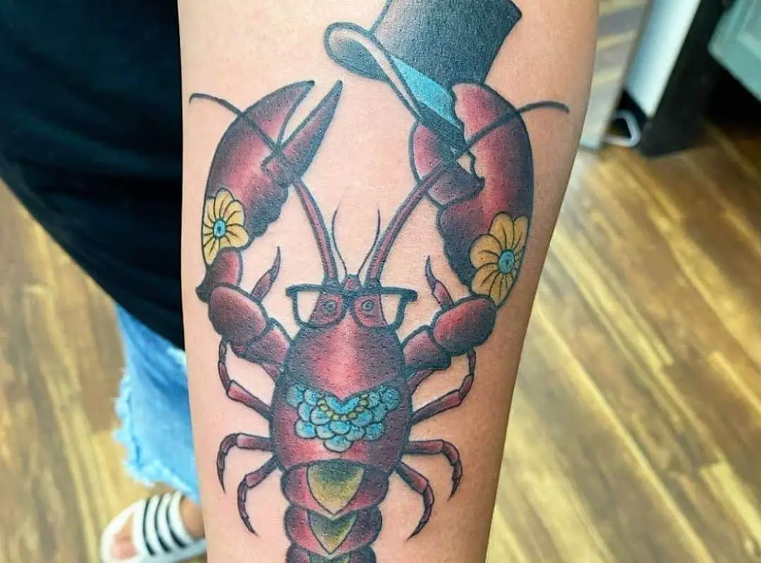 Red lobster with flowers and a hat tattoo