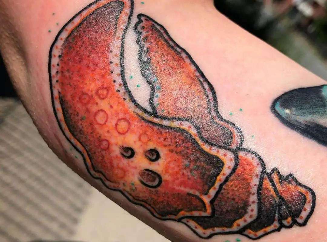 Red claw of traditional lobster tattoo