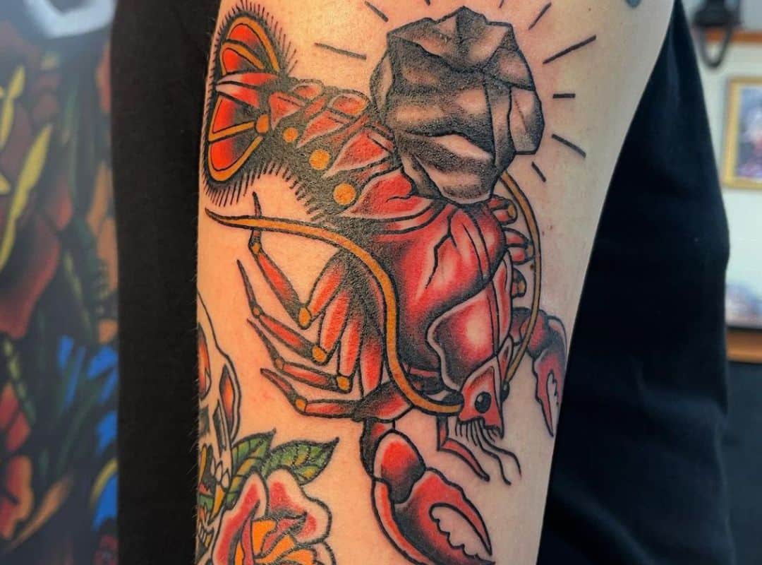 Red lobster attacked by the rock tattoo