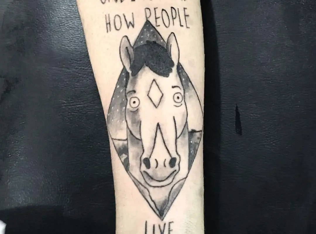 BoJack in a rhombus with signs tattoo