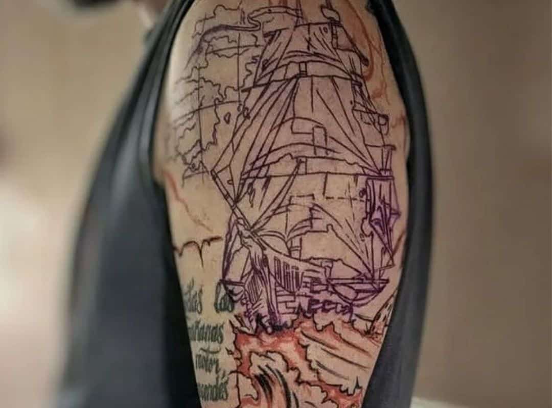 Violet and red outline ship tattoo