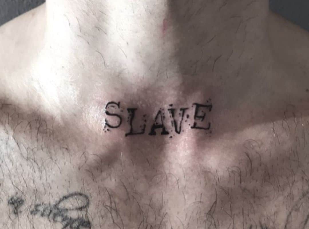 Slave sign neck tattoo