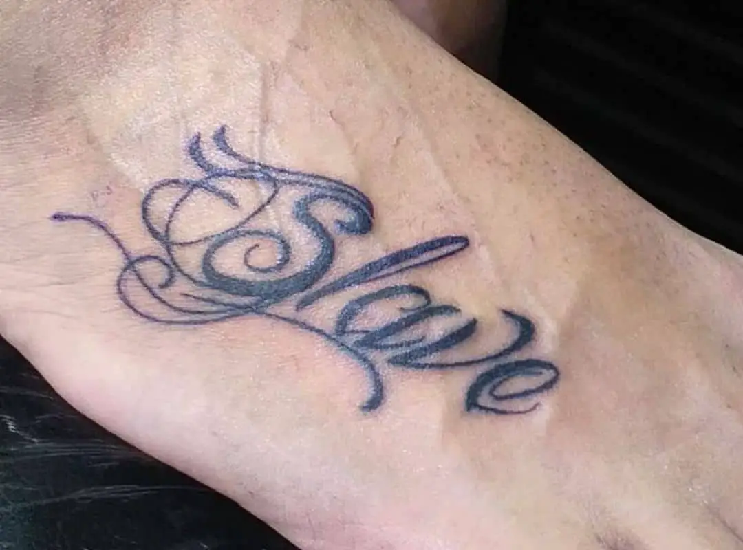 Slave leg tattoo