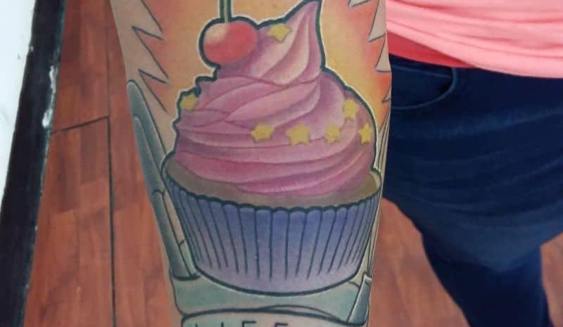 Sleeve cupcake tatto with fire tattoo