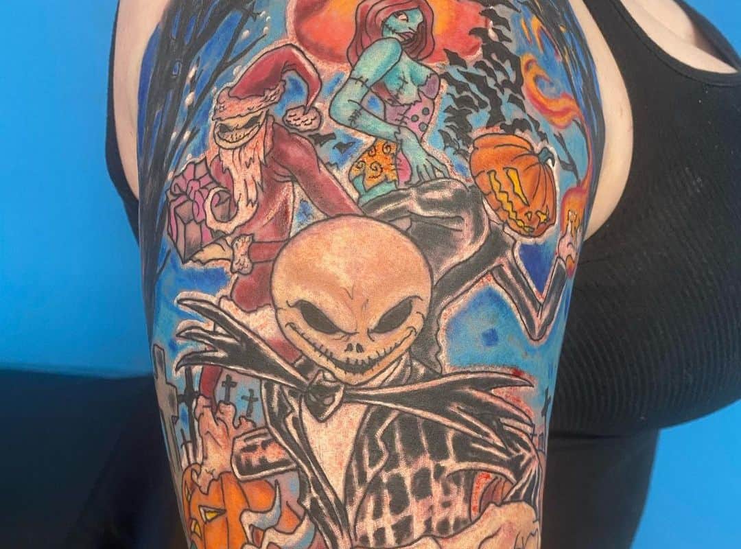 Sleeve tattoo with different scary cartoon characters 