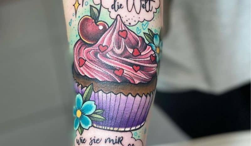 Sleeve with purple and pink cupcake tattoo