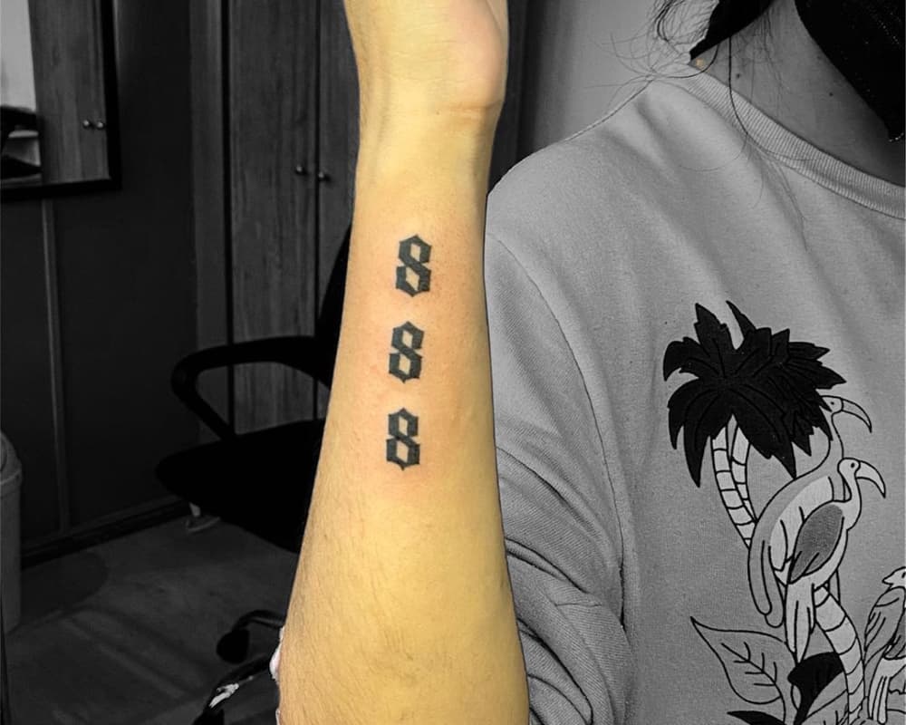 Tattoo 888 vertically on the arm