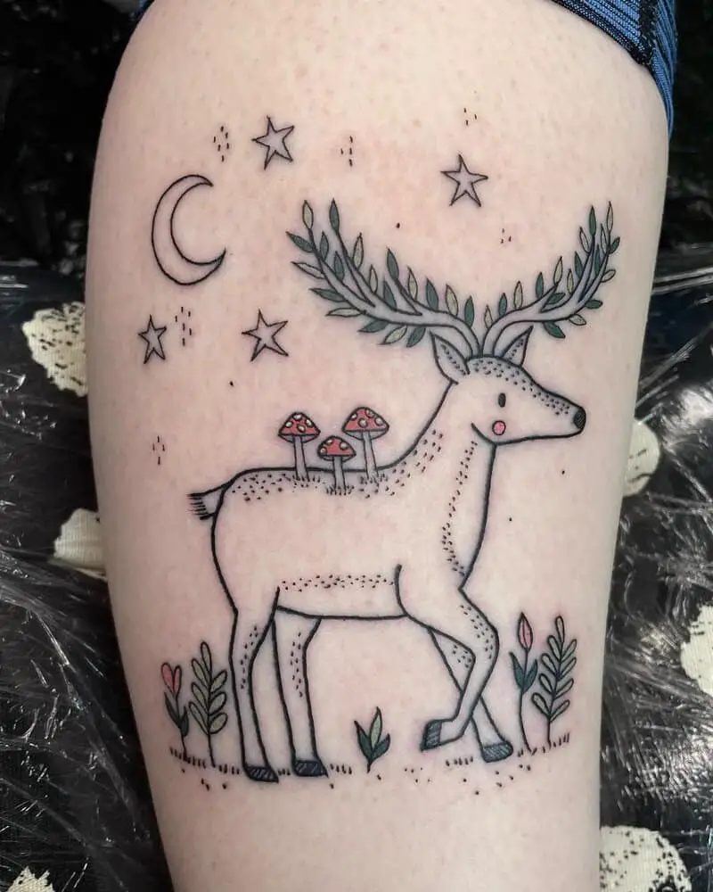 Tattoo in the form of a deer tree with mushrooms growing on it and plant branches instead of antlers
