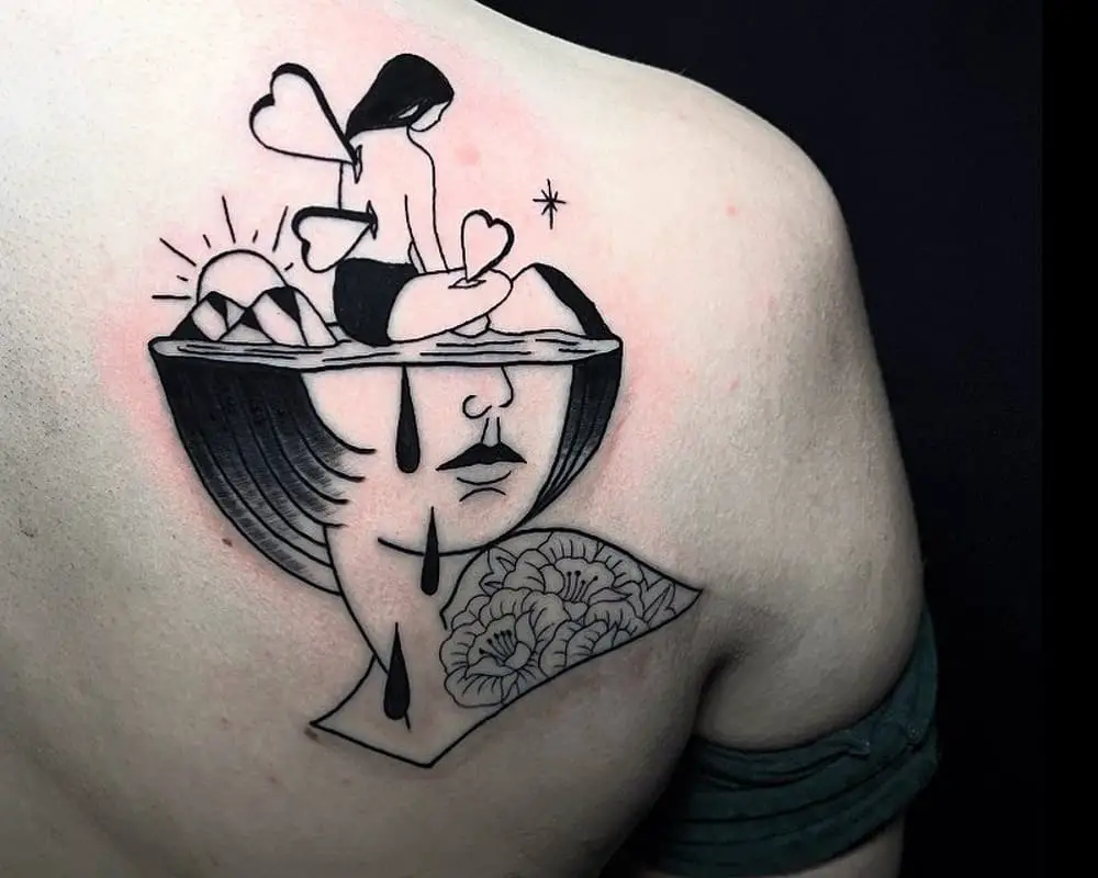 Tattoo in the form of half a head in which sits a girl pierced with hearts