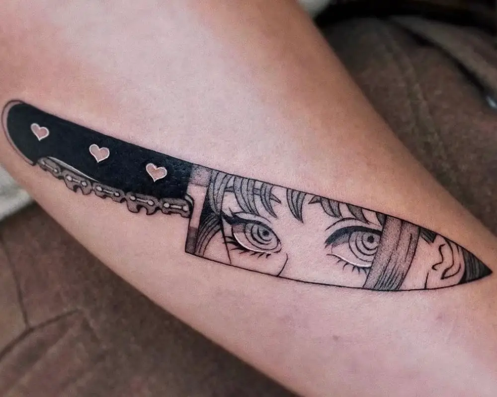 Tattoo in the shape of a knife with Makima's eyes on the blade
