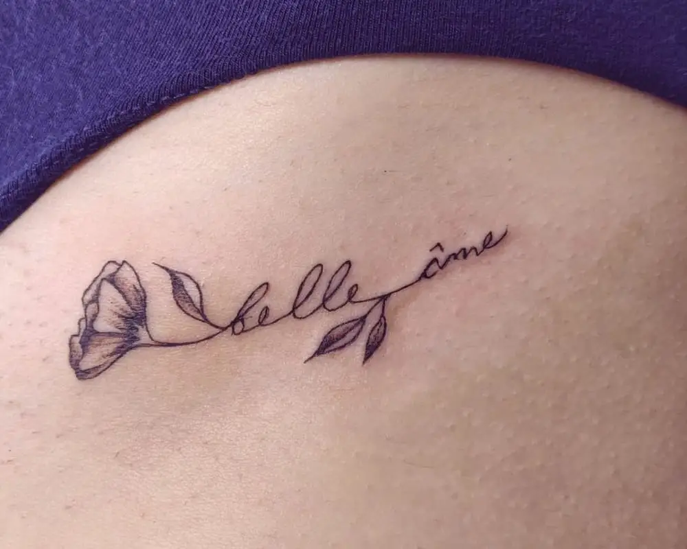Tattoo inscription in the form of a flower