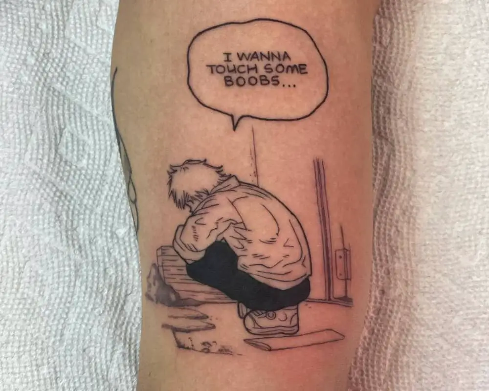 Tattoo of Denji squatting and saying I wanna touch some boobs...