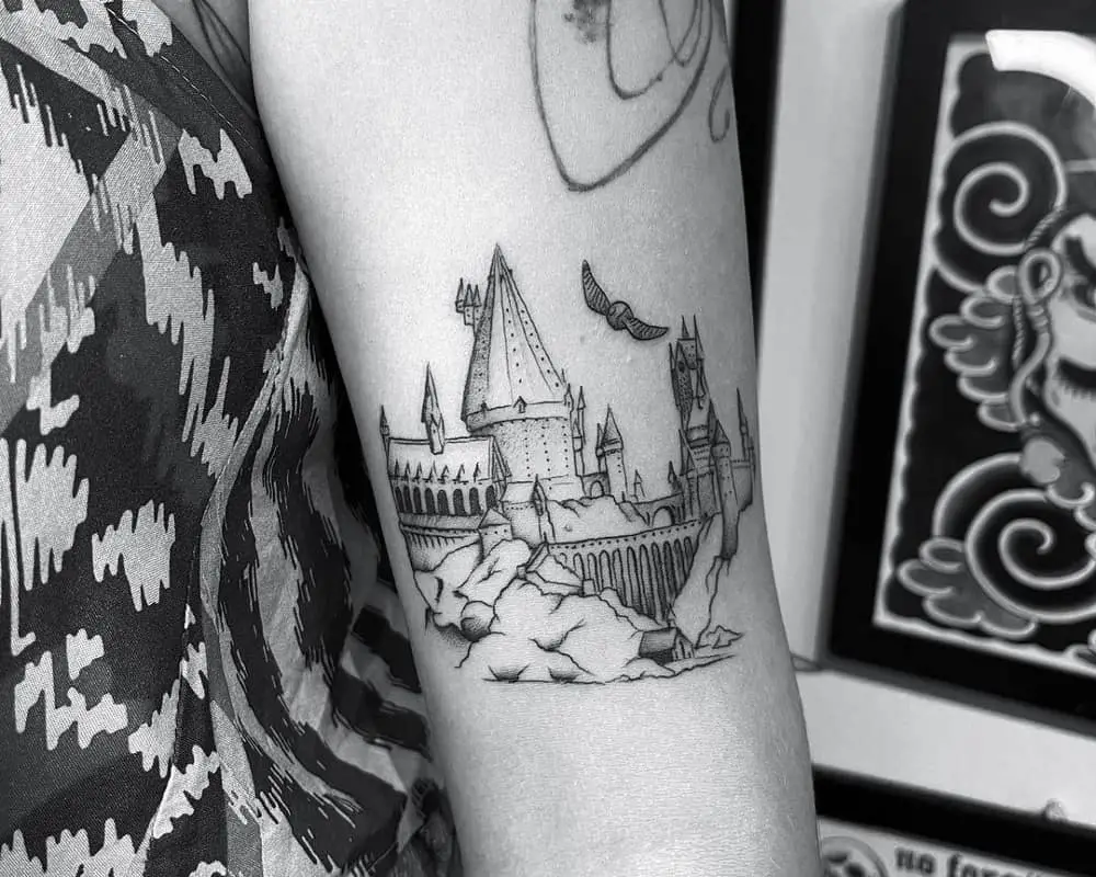 Tattoo of Hogwarts and a golden snitch
