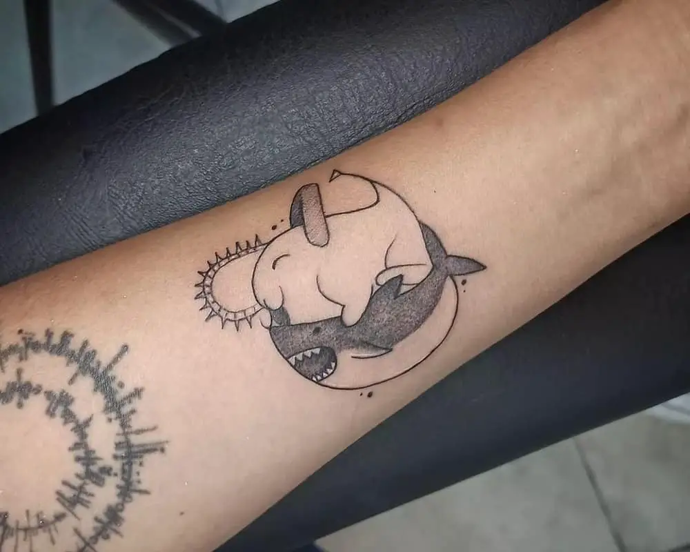 Tattoo of Pochita riding a shark