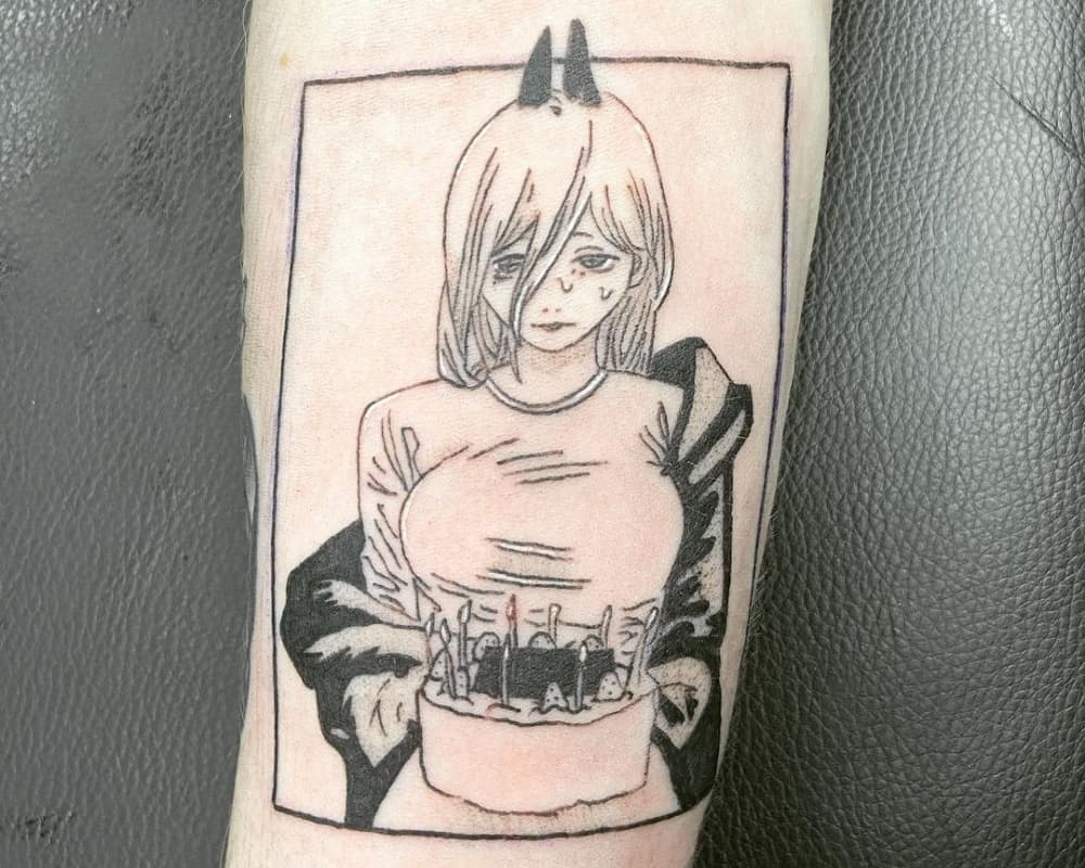 Tattoo of Power with a cake in her hands
