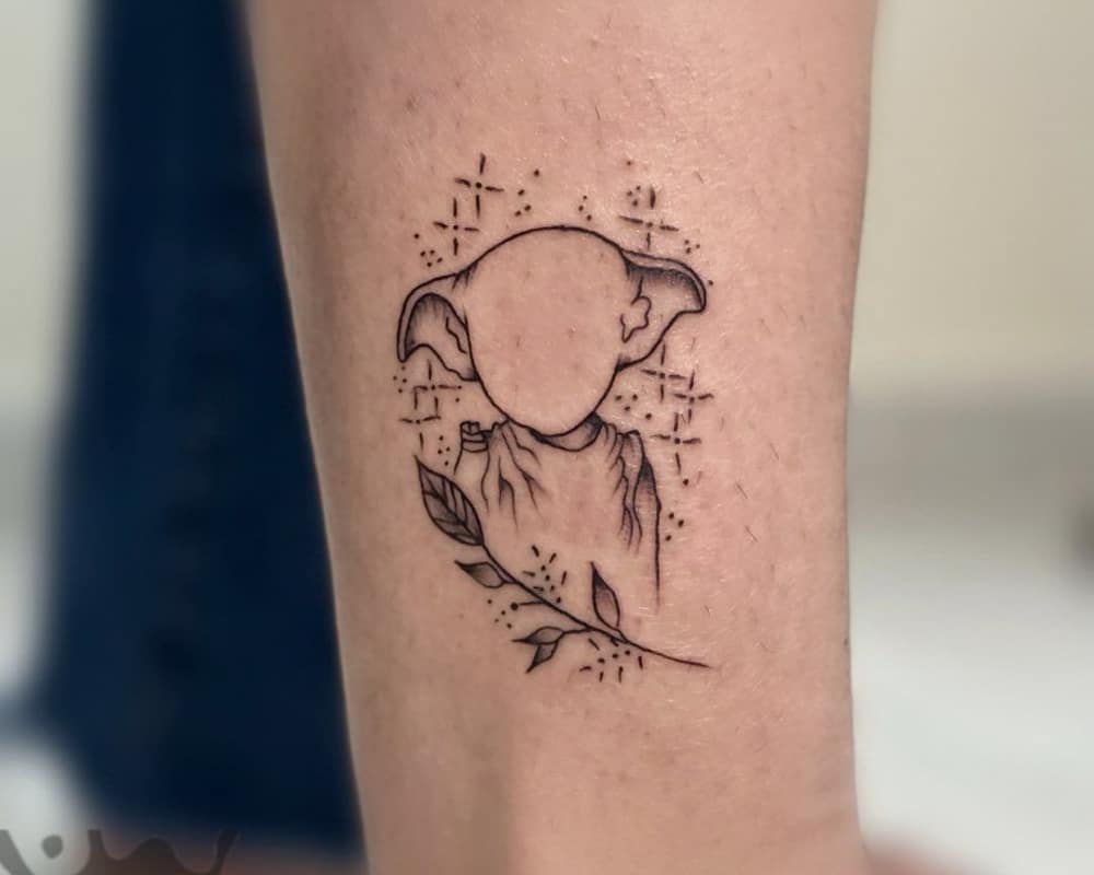 Tattoo of a Dobby silhouette