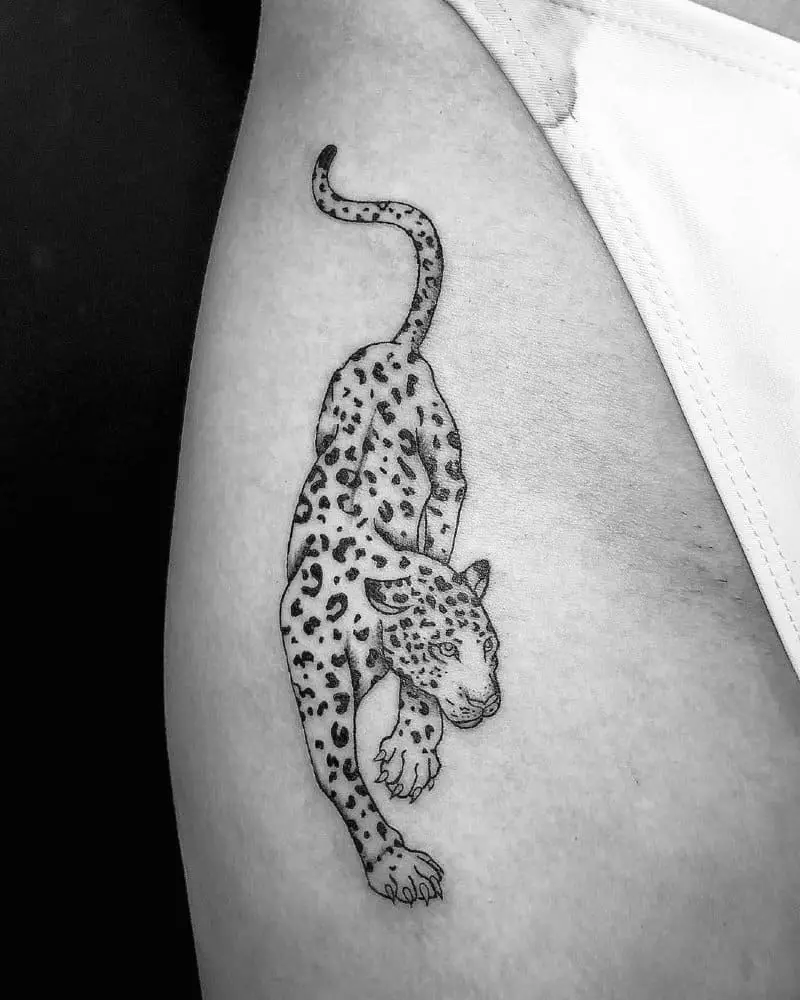 Tattoo of a crouching leopard