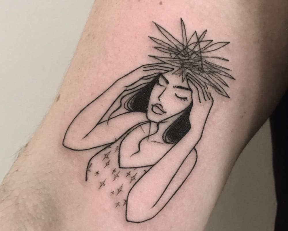 Tattoo of a girl with confused thoughts