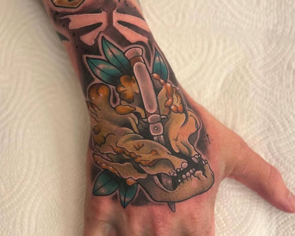 Tattoo of a knife stuck in Clicker's head