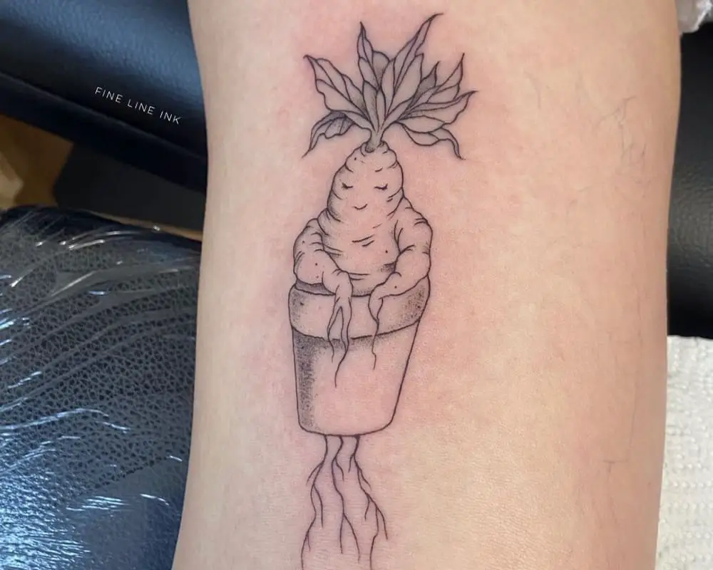 Tattoo of a mandrake root in a pot