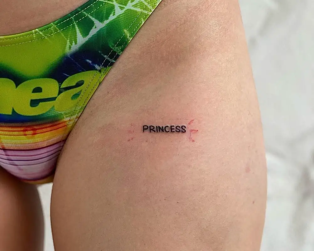 Tattoo of a princess on the thigh