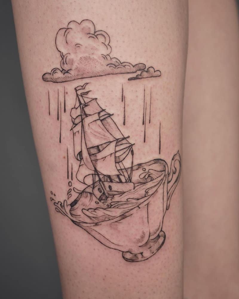 Tattoo of a ship in a storm in a cup