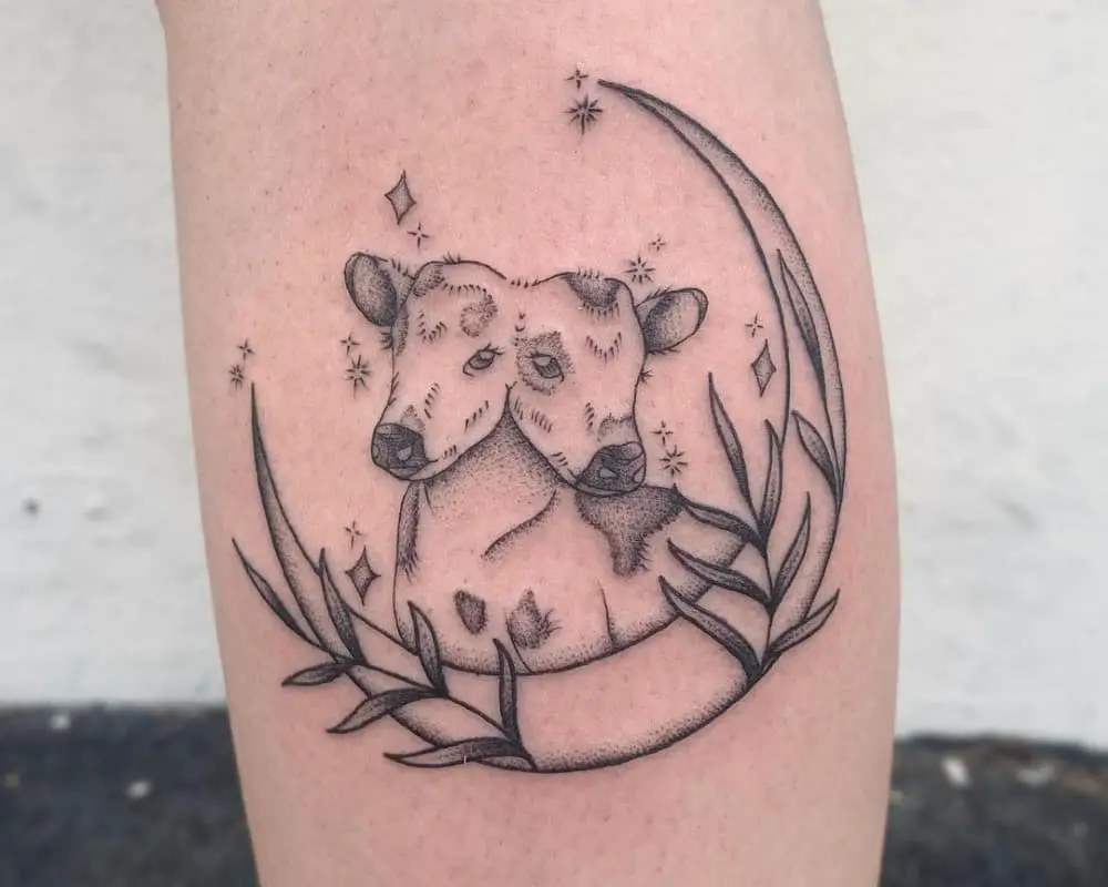 Tattoo of a two-headed calf in the moon