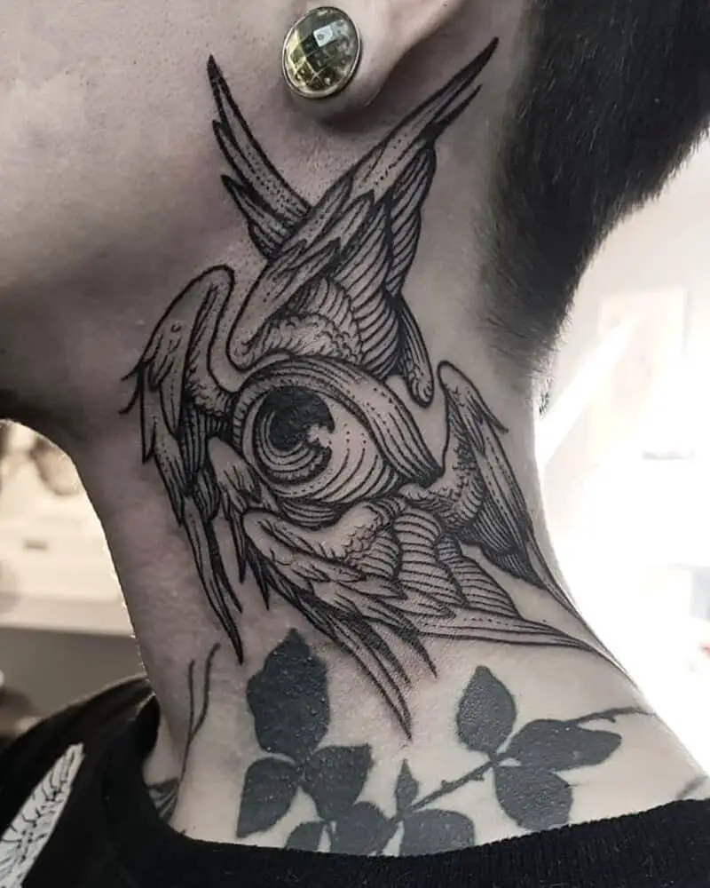 Tattoo of an angel in the shape of a six-winged eye, on the neck