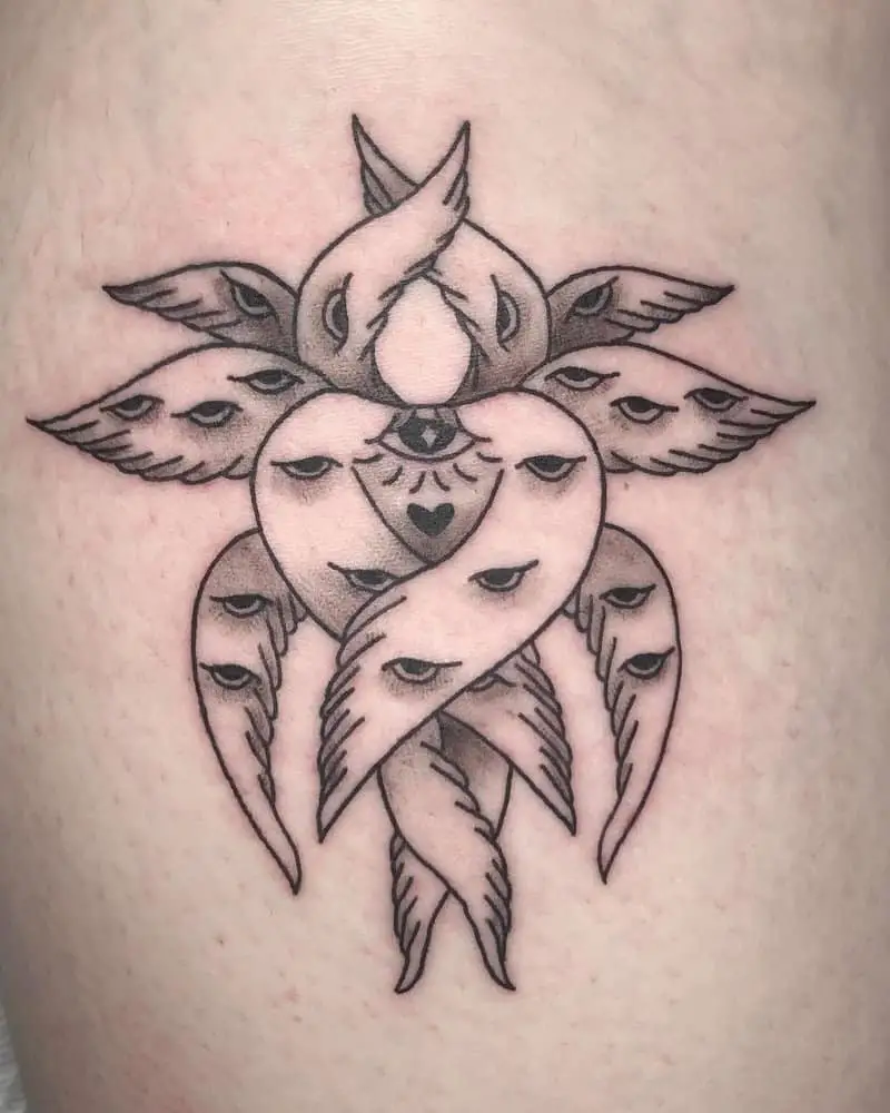 Tattoo of an angel with six pairs of wings and eyes