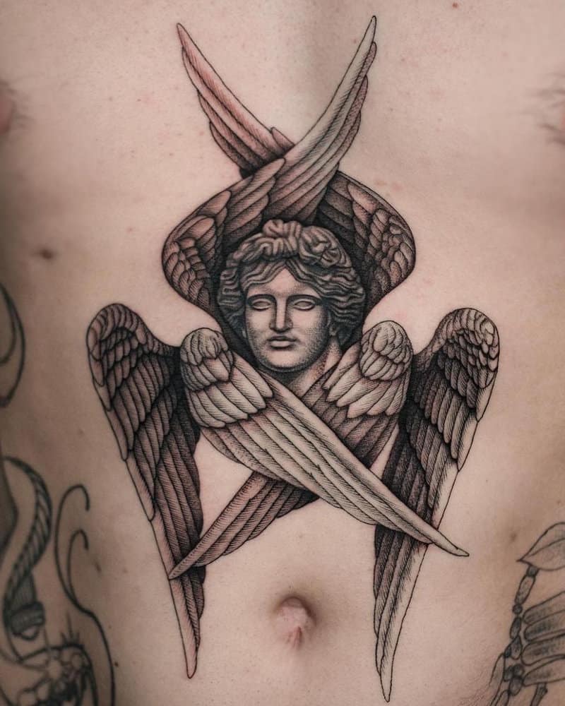 Tattoo of an angel with three pairs of wings and the face of a Roman sculpture